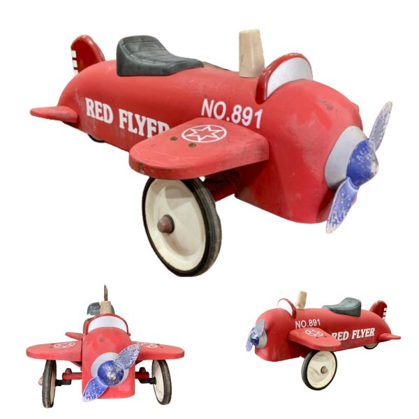 Antiguo avión de juguete